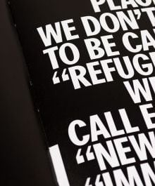 Book cover of Migration as Avant-Garde, with migrant tent made of pieces of sheets. Published by Verlag Kettler.