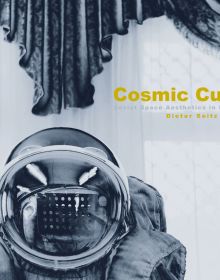 Landscape book cover of Cosmic Culture, Soviet Space Aesthetics in Everyday Life, featuring a Cosmonaut in helmet and suit, with drapes behind. Published by Verlag Kettler.