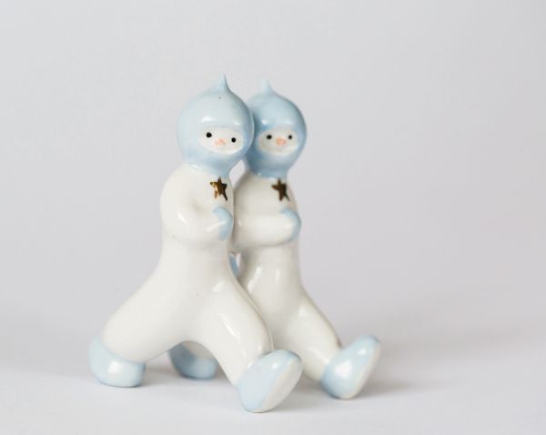 Landscape book cover of Cosmic Culture, Soviet Space Aesthetics in Everyday Life, featuring a Cosmonaut in helmet and suit, with drapes behind. Published by Verlag Kettler.