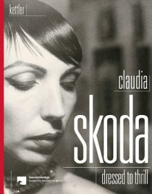 Book cover Claudia Skoda, Dressed To Thrill, with woman in dark make up and slick hairstyle. Published by Verlag Kettler.