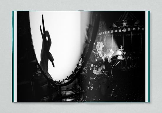 Book cover of Circus Noir, with a blurred atmospheric shot of circus performer waiting in the wings. Published by Verlag Kettler.