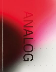 ANALOG in black font down centre of red, pink, white and black cover.