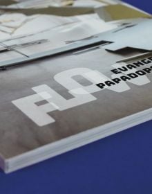 Book cover of Evangelos Papadopoulos, Flow, with an art installation made of building materials such as gypsum boards roof tiles, and light tubes. Published by Verlag Kettler.