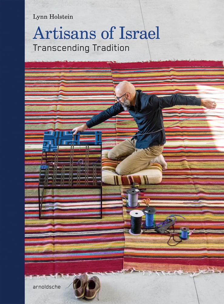 Book cover of Artisans of Israel: Transcending Tradition; featuring an artist weaving. Published by Arnoldsche Art Publishers.