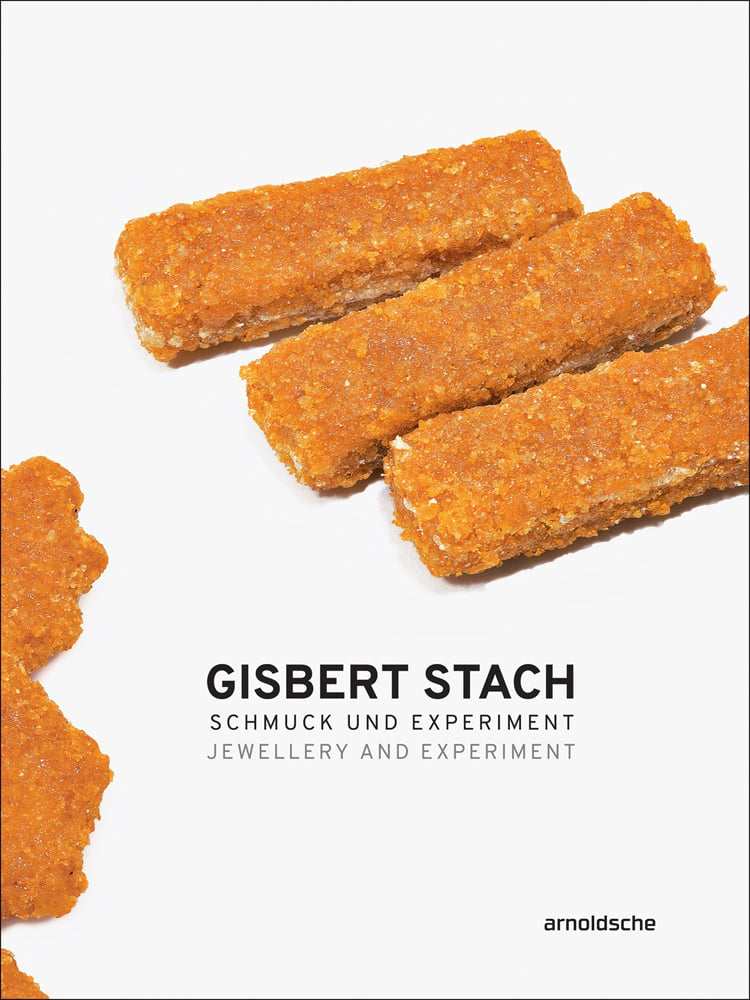 3 long amber sandwich biscuits, on white cover, Gisbert Stach Jewellery and Experiment in black font below