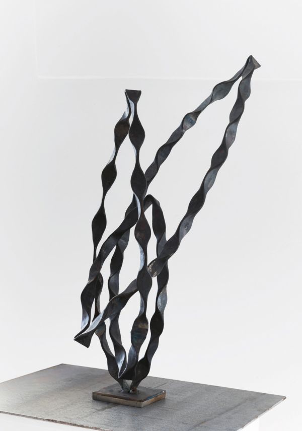 Book cover of Gabriele Kutschera: Forged Iron - Jewellery - Paper, featuring an iron sculpture. Published by Arnoldsche Art Publishers.