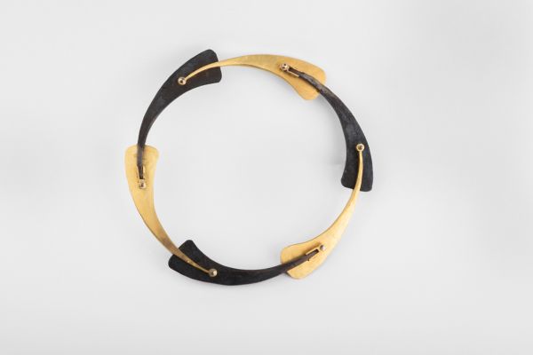 Book cover of Gabriele Kutschera: Forged Iron - Jewellery - Paper, featuring an iron sculpture. Published by Arnoldsche Art Publishers.