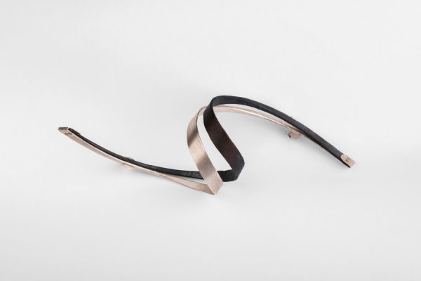 Book cover of Gabriele Kutschera: Forged Iron - Jewellery - Paper, featuring an iron sculpture. Published by Arnoldsche Art Publishers.