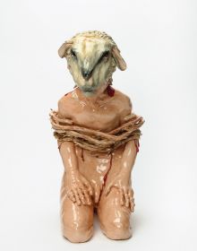 Glazed red ceramic wheel shape, on white cover, Vessel Sculpture 3 in dark red font to top