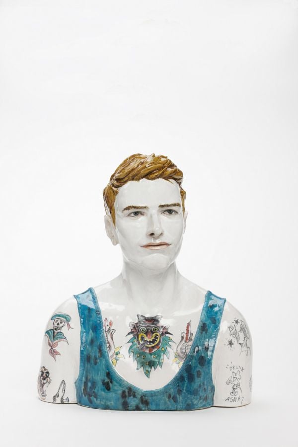 Glazed red ceramic wheel shape, on white cover, Vessel Sculpture 3 in dark red font to top