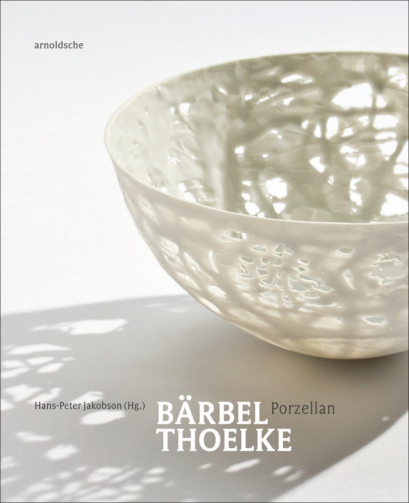 Delicate cream filigree porcelain bowl, on white cover, Barbel Thoelke Porzellan in white and black font below