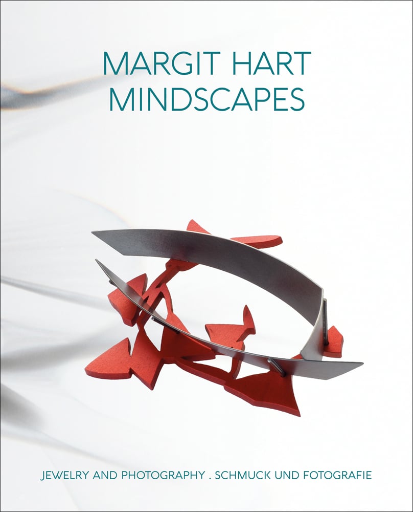 3D abstract jewellery piece in red and grey, white cover, MARGIT HART MINDSCAPES in green font above.