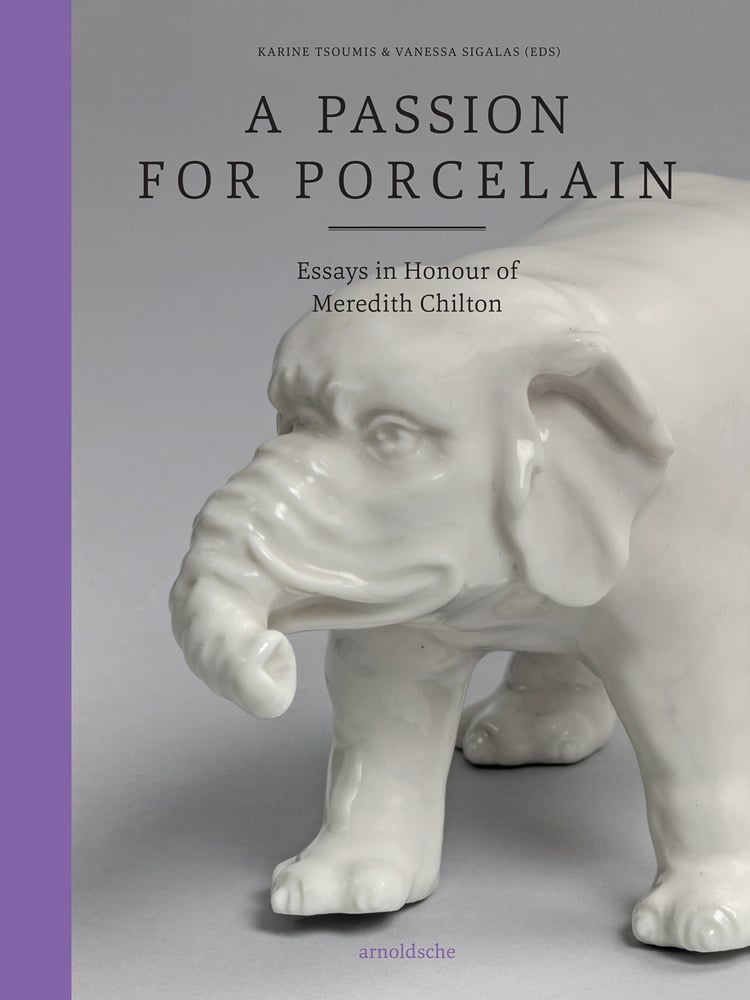 Cream porcelain elephant figure on grey cover, A Passion for Porcelain in black font above, left purple border