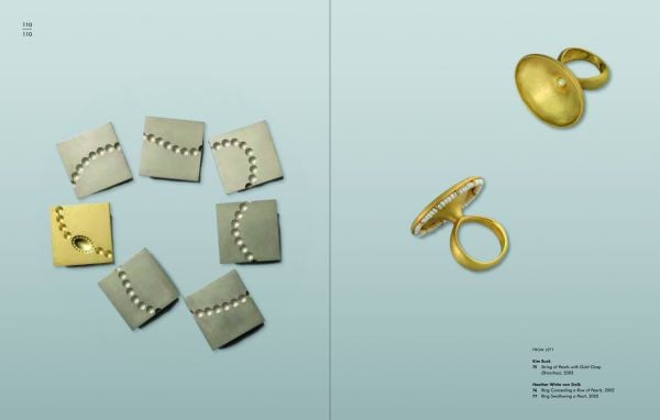 Red filter on jewelry piece, on cover of 'Jewelry Stories Highlights from the Collection 1947-2019'. by Arnoldsche Art Publishers.