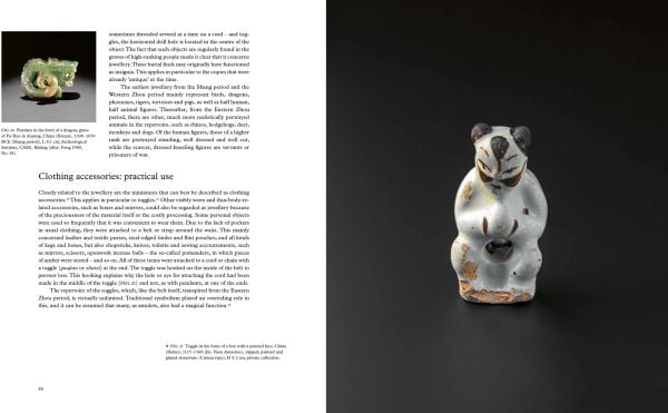 Miniature ceramic cow, Chinese figure leaning on opposite side, on black cover of 'Small China, Early Chinese Miniatures', by Arnoldsche Art Publishers.