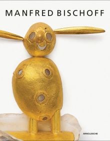 Bright gold rabbit-shaped figure on off white cover of 'Manfred Bischoff, Ding Dong', by Arnoldsche Art Publishers.