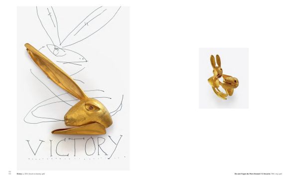 Bright gold rabbit-shaped figure on off white cover of 'Manfred Bischoff, Ding Dong', by Arnoldsche Art Publishers.