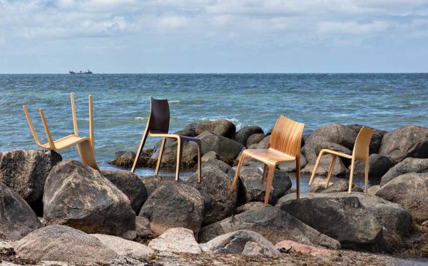 Minimalist Danish Lido Lounge Chair, on white cover of 'Jakob Berg: Furniture', by Arnoldsche Art Publishers.