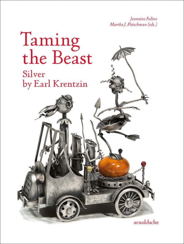 Book cover of Taming the Beast: Silver by Earl Krentzin, featuring a silver sculpture of open roofed car with bird at wheel, and creature balancing on orange egg to rear. Published by Arnoldsche Art Publishers.