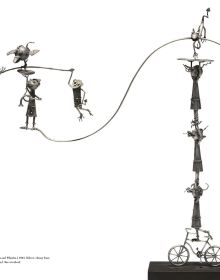 Book cover of Taming the Beast: Silver by Earl Krentzin, featuring a silver sculpture of open roofed car with bird at wheel, and creature balancing on orange egg to rear. Published by Arnoldsche Art Publishers.