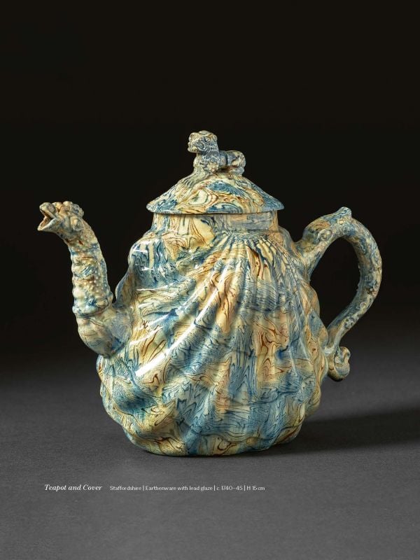 Book cover of The Man with the Butterfly Tie: Ceramics Essays in Honour of Brian Haughton, featuring a painting of white flower shrub, pink butterflies hovering above. Published by Arnoldsche Art Publishers.