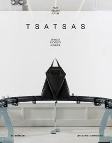 Book cover of TSATSAS, past present future, with a large black leather bag on metal stand. Published by Arnoldsche Art Publishers.