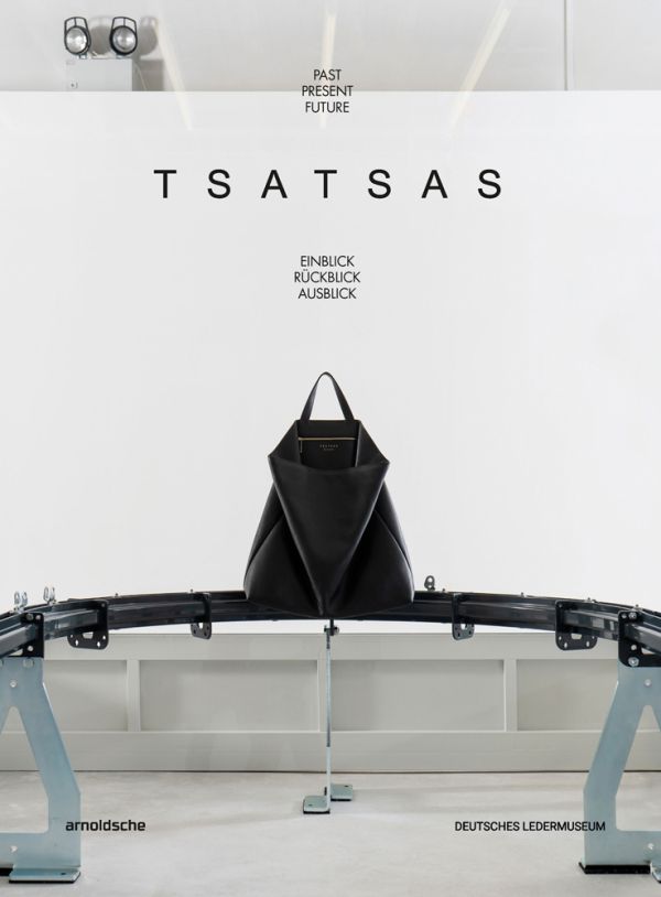 Book cover of TSATSAS, past present future, with a large black leather bag on metal stand. Published by Arnoldsche Art Publishers.