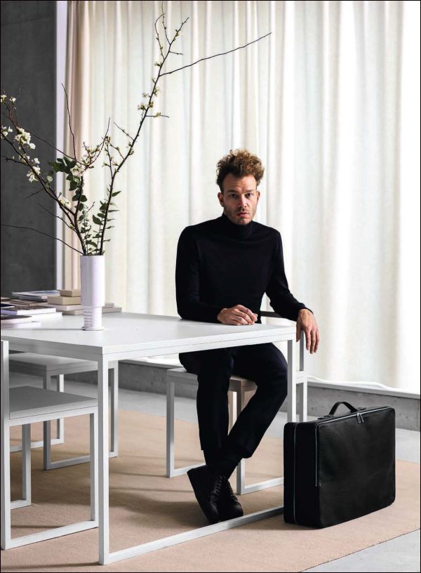 Book cover of TSATSAS, past present future, with a large black leather bag on metal stand. Published by Arnoldsche Art Publishers.