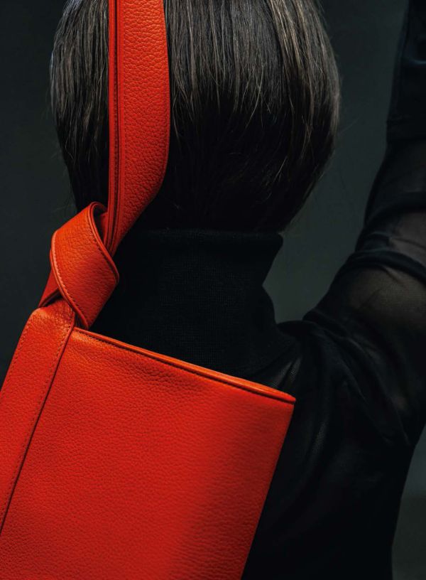 Book cover of TSATSAS, past present future, with a large black leather bag on metal stand. Published by Arnoldsche Art Publishers.