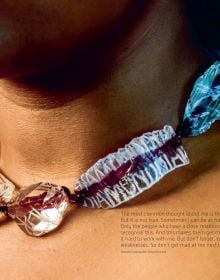 Book cover of LithoMania, Design Lab #11, with an amber jewel balancing on forehead. Published by Arnoldsche Art Publishers.