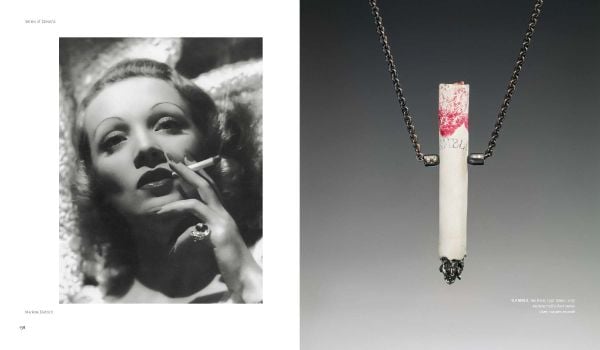 Book cover of The Art & Times of Daniel Jocz, featuring a grey shapes adorned with small gold beads. Published by Arnoldsche Art Publishers.