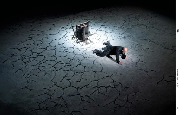 Book cover of The Scene and the Unseen, Opera in Pictures. Photographs by Monika Rittershaus, with a Opera theatre production, with three windswept figures with water splashing at feet. Published by Arnoldsche Art Publishers.
