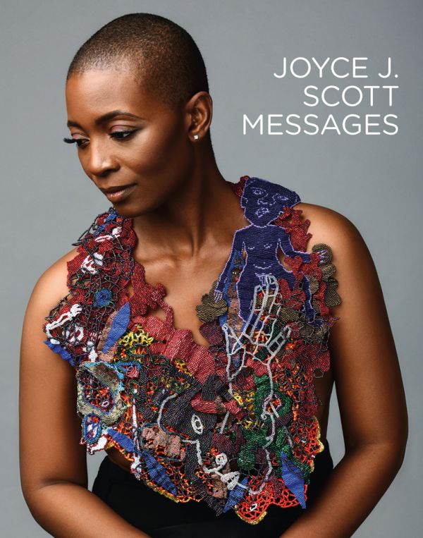 Book cover of Joyce J. Scott: Messages, with female modelling large, intricate beaded neck piece. Published Arnoldsche Art Publishers.