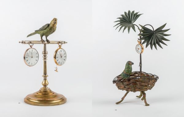 Book cover of Taschenuhrständer – Pocket-Watch Stands – Porte-montre, with an ornate pocket watch stand featuring a green bird to top. Published by Arnoldsche Art Publishers.