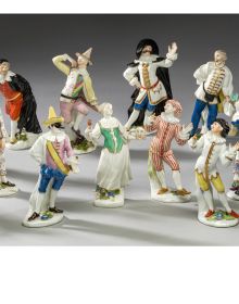 Book cover of Magnificence of Rococo: Kaendler’s Meissen Porcelain Figures, with a porcelain figurine of two figures. Published by Arnoldsche Art Publishers.
