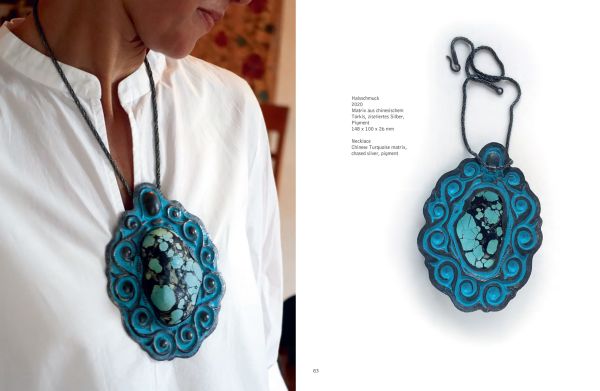 White book cover of Daniel Kruger, Jewellery – The unexpected meaning of curious things, featuring four colourful shell-shaped brooches face down. Published by Arnoldsche Art Publishers.