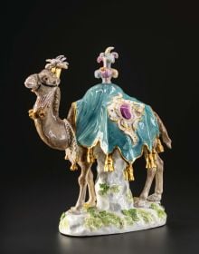 Book cover of Courtly Pleasures: Table Decorations as a Reflection of Baroque Society; featuring two ceramic figurines. Published by Arnoldsche Art Publishers.