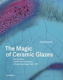 Book cover of The Magic of Ceramic Glazes: Nils Thorsson and the Artist Stoneware of Royal Copenhagen 1932–1975; featuring a blue and pink ceramic glazed surface. Published by Arnoldsche Art Publishers.