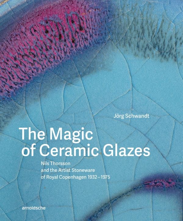 Book cover of The Magic of Ceramic Glazes: Nils Thorsson and the Artist Stoneware of Royal Copenhagen 1932–1975; featuring a blue and pink ceramic glazed surface. Published by Arnoldsche Art Publishers.