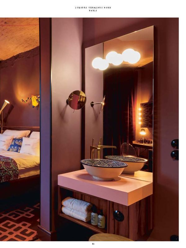 Mural of sea captain smoking a pipe on wall of luxury hotel, on cover of 'off the wall, flying thoughts: hotel, restaurant and bar design. Dreimeta 2003-2018', by Avedition Gmbh.