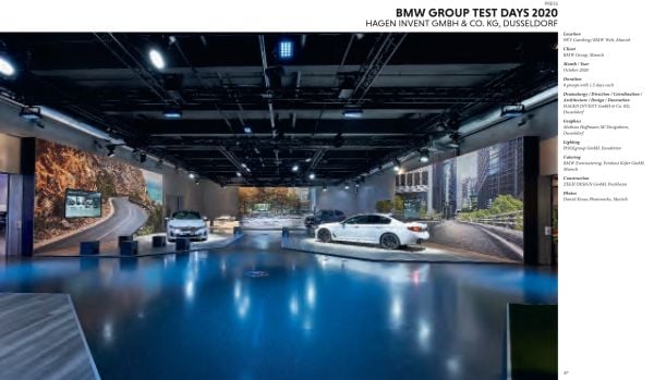 White architectural building with emojis of hearts, smiley faces, thumbs up and clapping hands, on cover of 'Event Design Yearbook, Special Edition', by Avedition Gmbh.