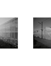 Long building with illuminated windows, under dark moody sky, on cover of 'The Urban in the Periphery, European Architectural Photography Prize 2021', by Avedition Gmbh.