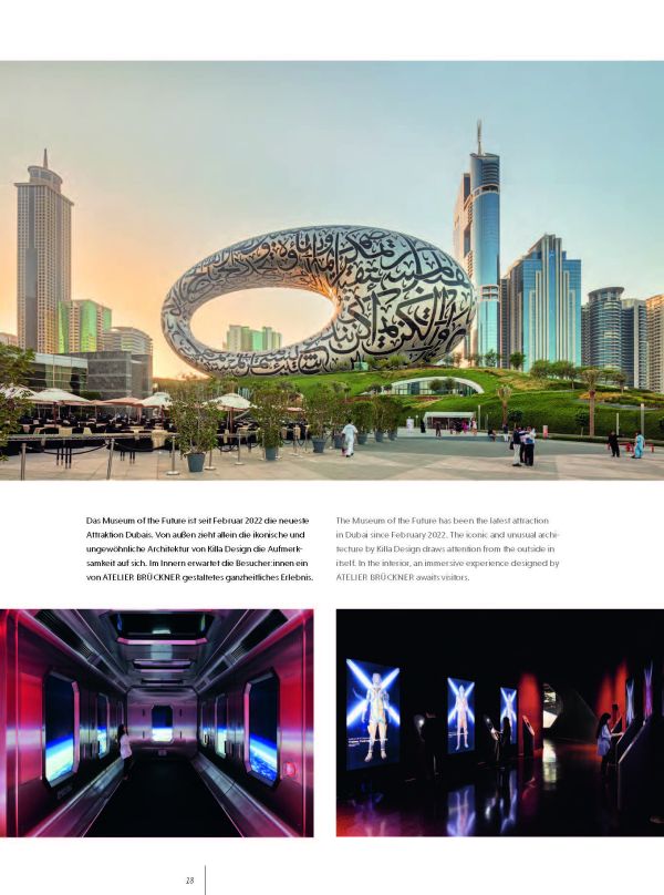 Book cover of Event Design Yearbook 2022 / 2023, with an exhibition space, and a man looking at figure with wings fighting figure with sword. Published by Avedition Gmbh.