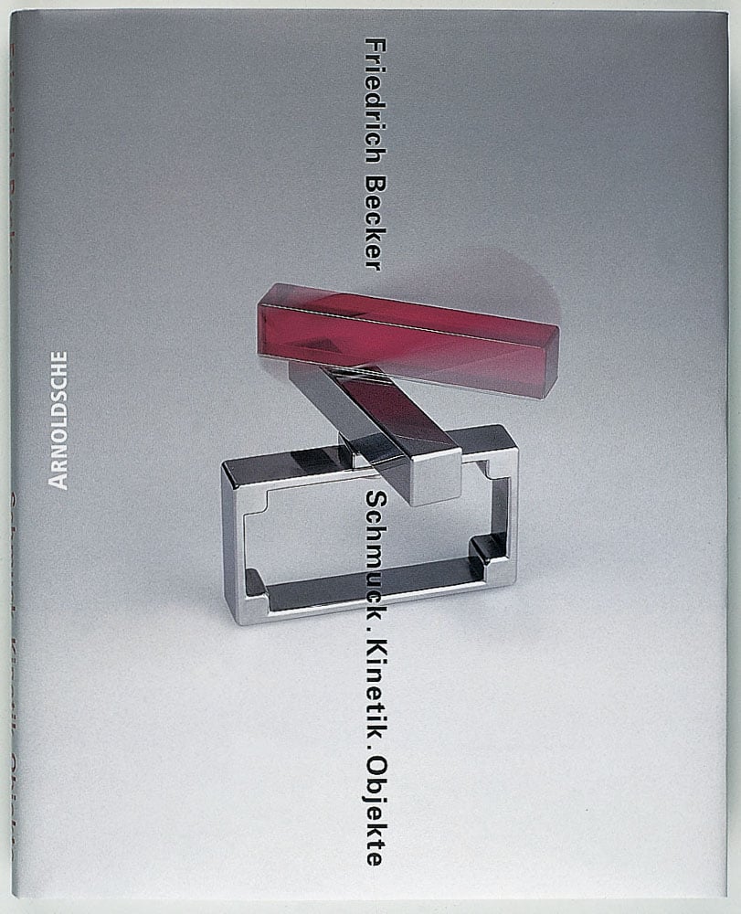 Book cover of Friedrich Becker: Kinetic Jewellery; featuring a piece of metal jewellery/ Published by Arnoldsche Art Publishers.