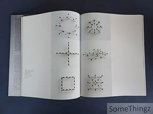Book cover of Friedrich Becker: Kinetic Jewellery; featuring a piece of metal jewellery/ Published by Arnoldsche Art Publishers.