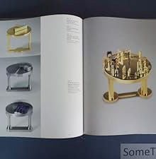 Book cover of Friedrich Becker: Kinetic Jewellery; featuring a piece of metal jewellery/ Published by Arnoldsche Art Publishers.