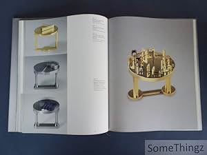 Book cover of Friedrich Becker: Kinetic Jewellery; featuring a piece of metal jewellery/ Published by Arnoldsche Art Publishers.