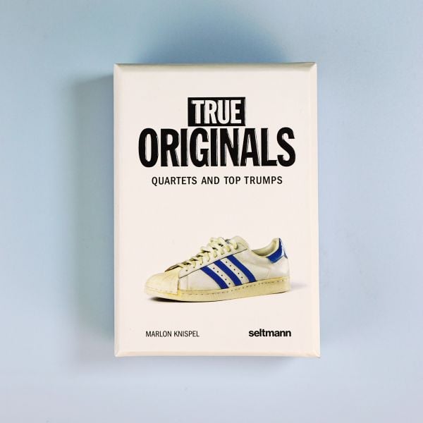 Book cover of True Originals: Quartets and top trumps, with a white adidas sneaker with blue stripes. Published by Seltmann Publishers.