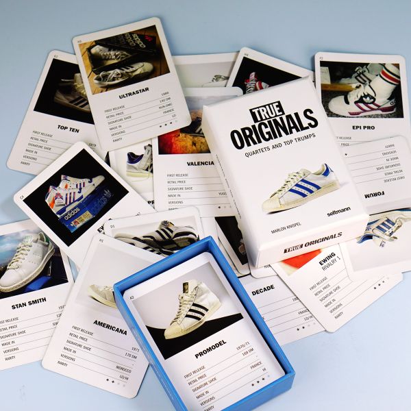 Book cover of True Originals: Quartets and top trumps, with a white adidas sneaker with blue stripes. Published by Seltmann Publishers.
