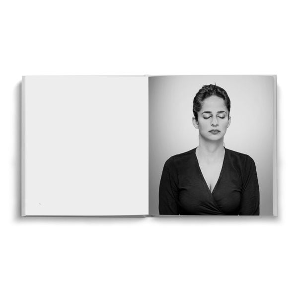 Book cover of Silent Portraits, featuring a male with his eyes closed, in deep meditation. Published by Seltmann Publishers.